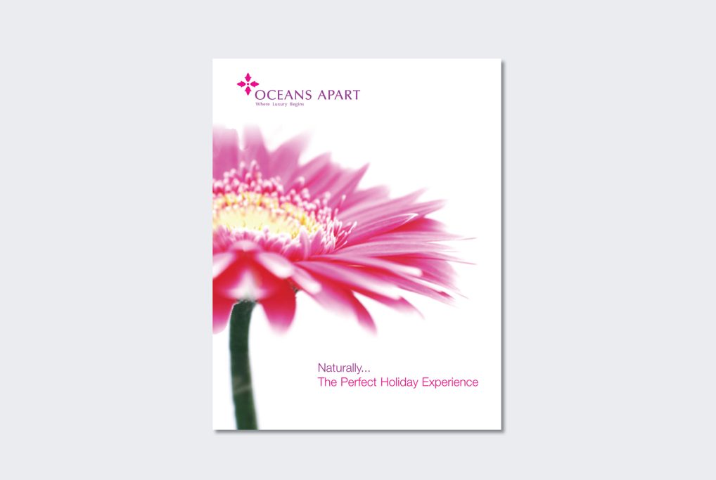 Pink flower with a soft background, featuring elegant typography and logo.