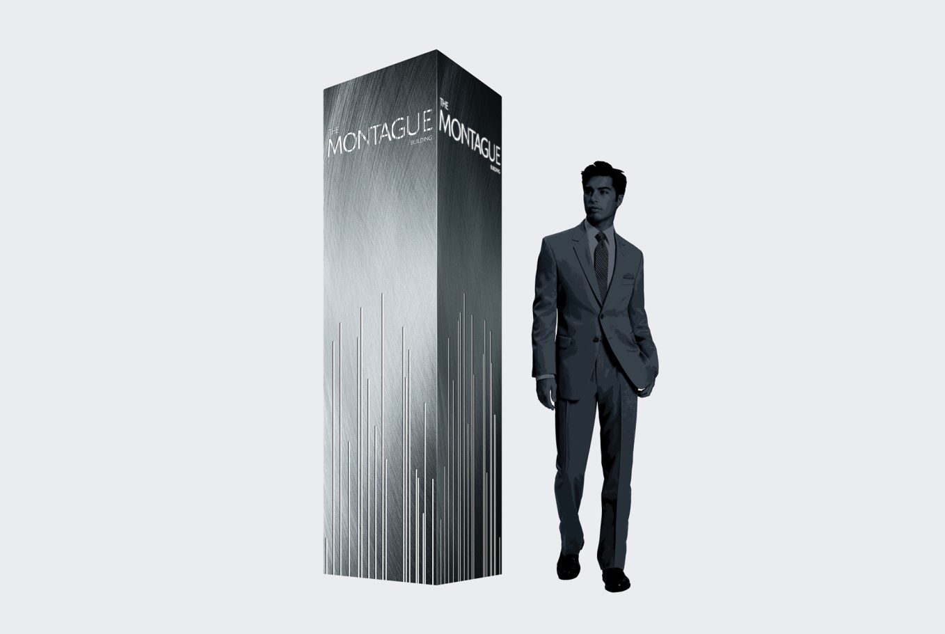 A man in a suit standing next to a tall, abstract monument.
